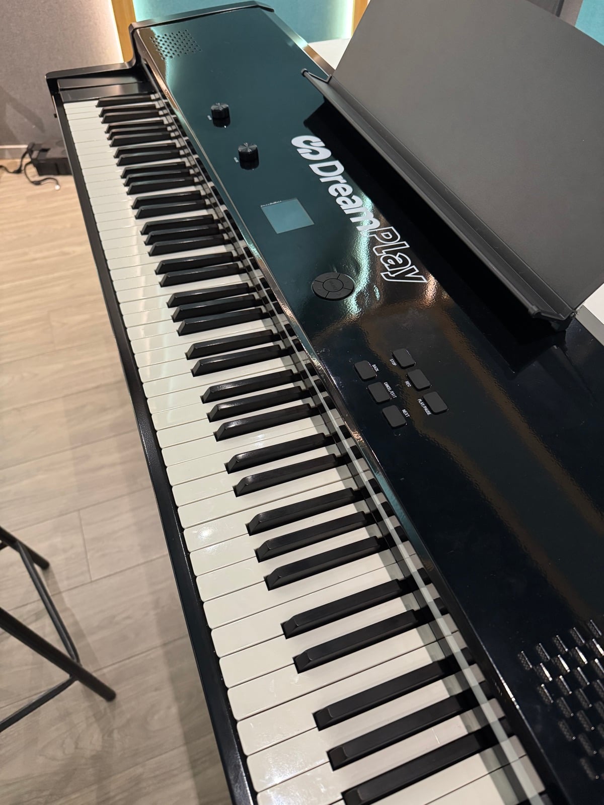 DreamPlay control panel with volume and reverb knobs, screen and transport buttons